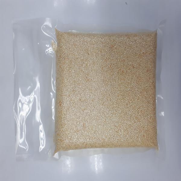Roasted white sesame seeds in vacuum bag